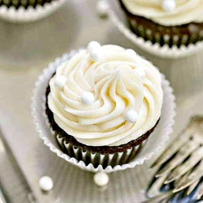 Vanilla Buttercream Topped Cocoa Cupcakes - Perfect for Celebrations! - That Skinny Chick Can Bake