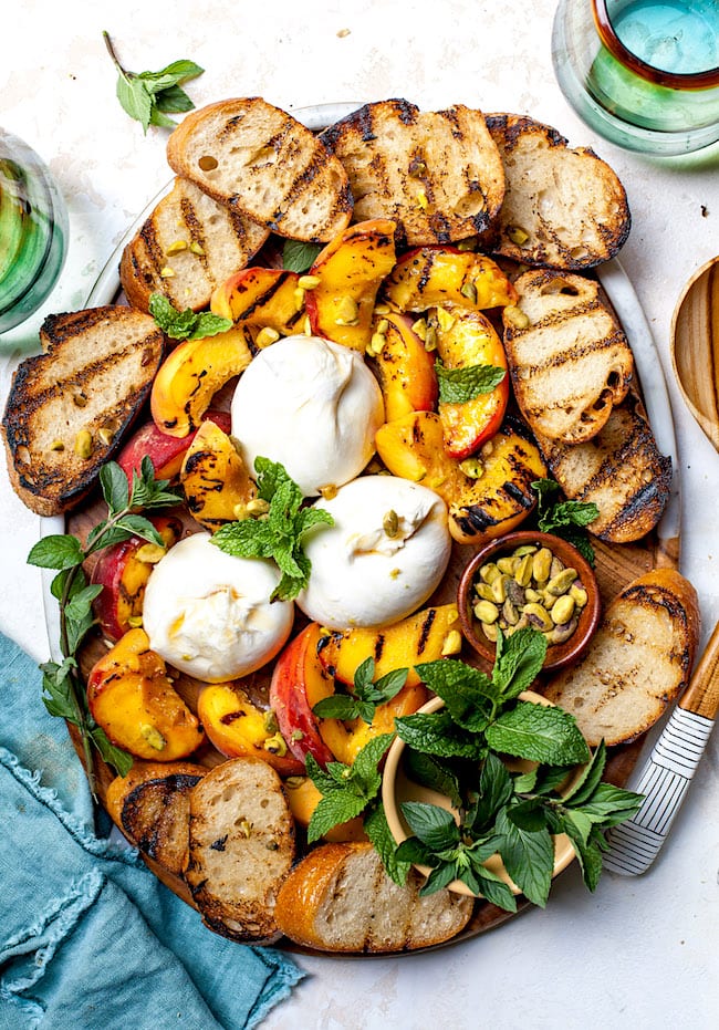 Grilled Peaches with Burrata, Honey, & Pistachios - Two Peas & Their Pod Grilled Peaches with Burrata, Honey, & Pistachios - Two Peas & Their Pod