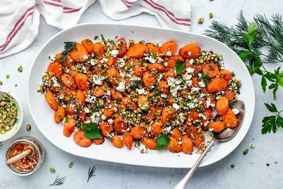 Sweet and Spicy Roasted Carrots with Hot Honey, Feta, and Pistachios